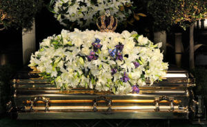 Michael Jackson's Gold Casket with Lillies and a Kings Crown at the Top