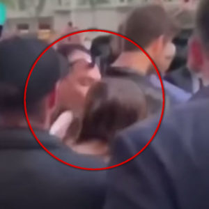 Fan Kissing Miley Cyrus with red circle highligting moment